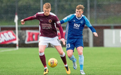 Cook puts pen to paper